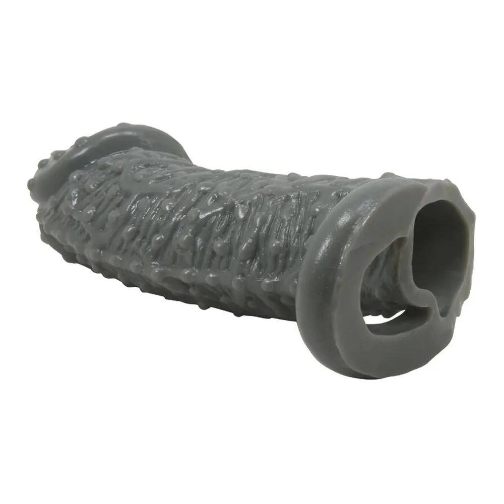 Manchon pénien en silicone gris avec surface texturée de picots irréguliers, anneau de préhension à la base, sur fond blanc