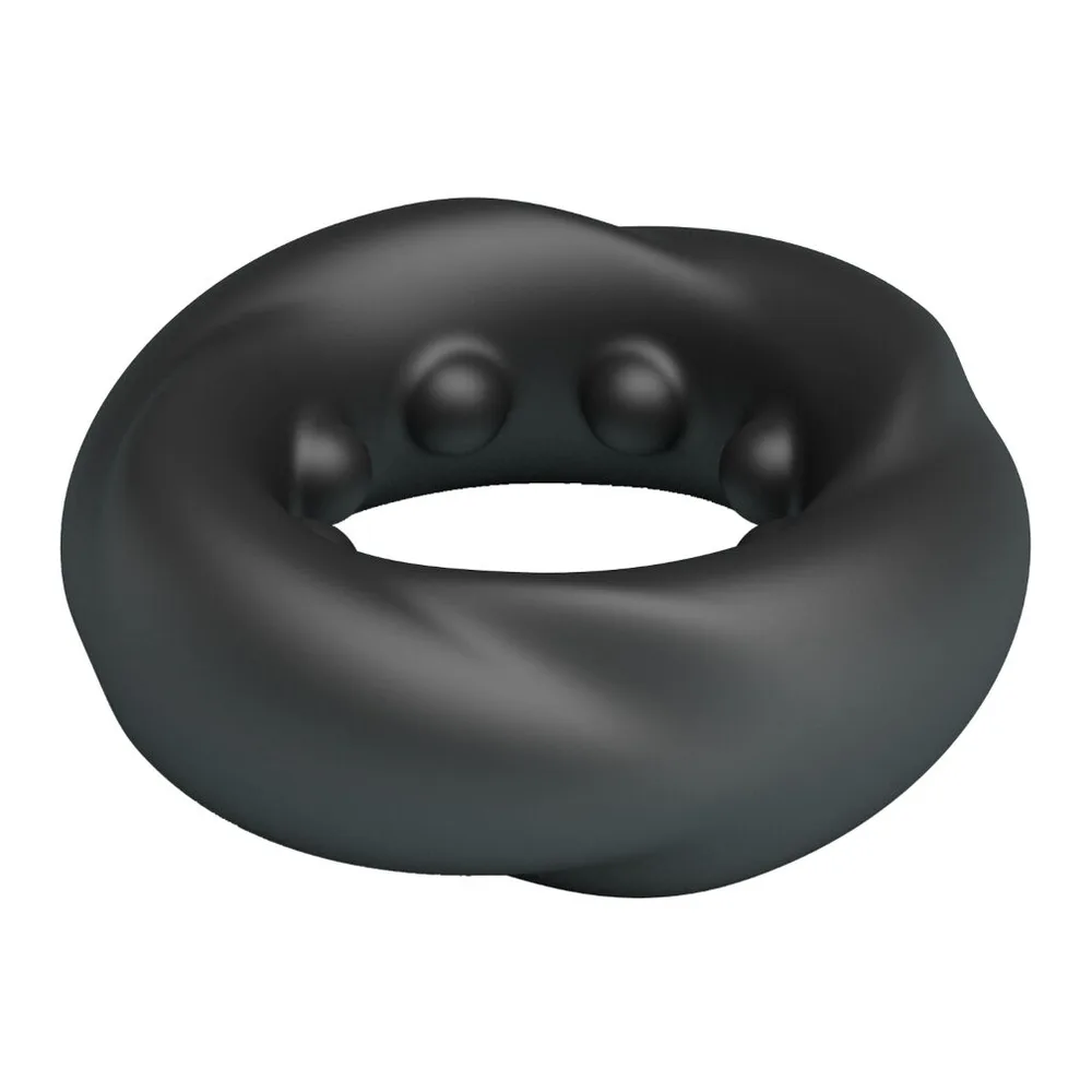 Anneau en silicone noir de forme arrondie, avec cannelures visibles sur la surface, présenté sur fond blanc