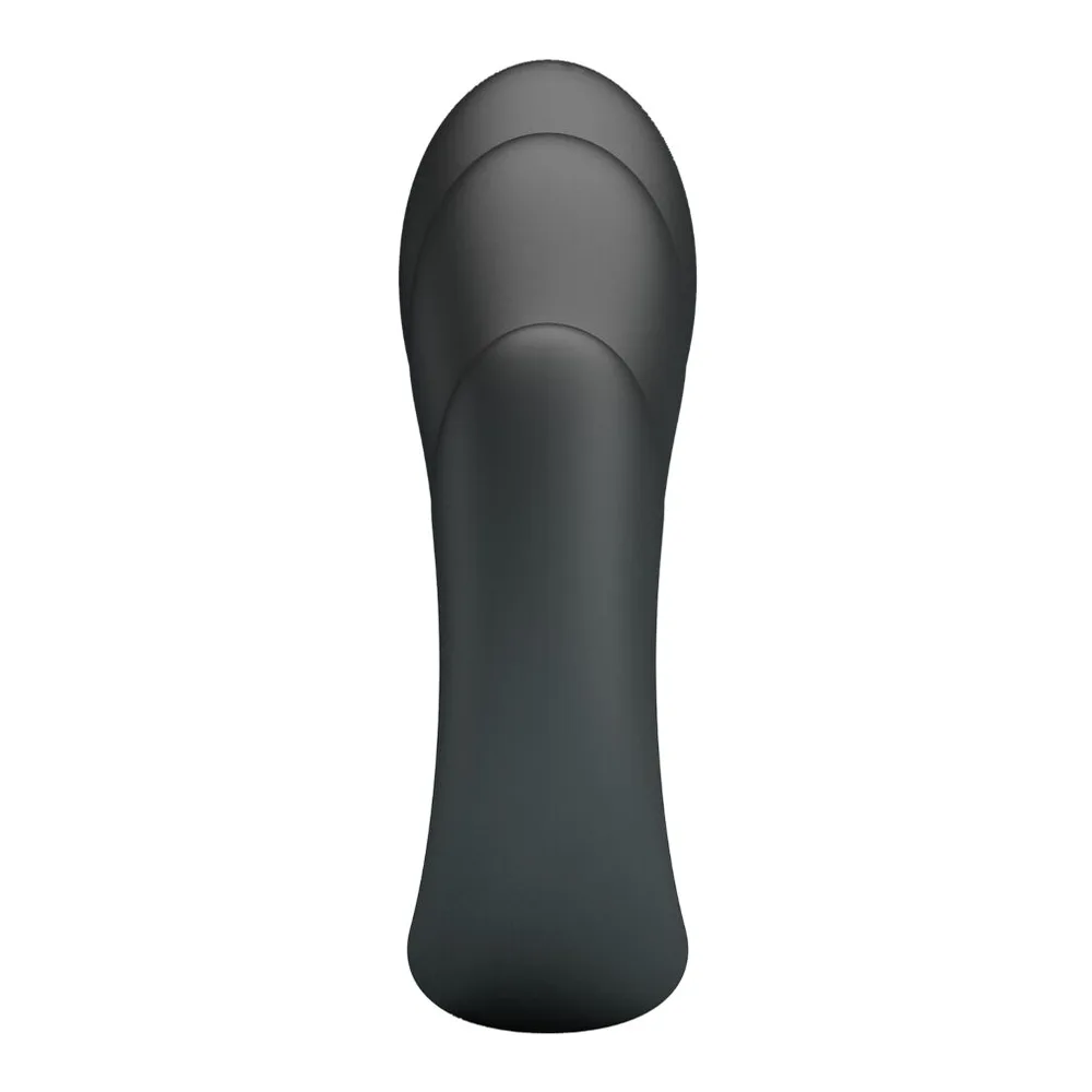 Cockring en silicone noir avec forme ergonomique, quatre bosses en relief et ouverture ajustable, sur fond blanc