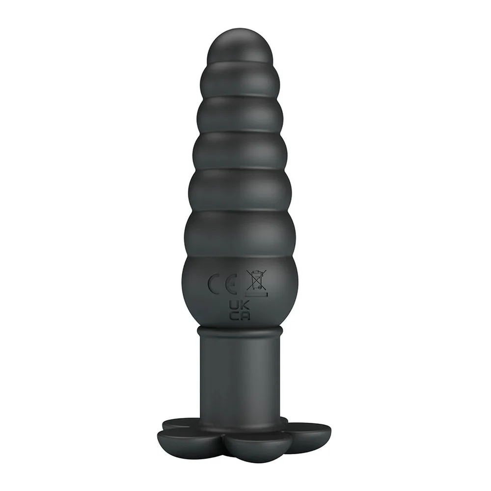 Plug anal en silicone noir avec corps annelé en spirale, base élargie en forme de fleur, marquages de conformité visibles sur le corps
