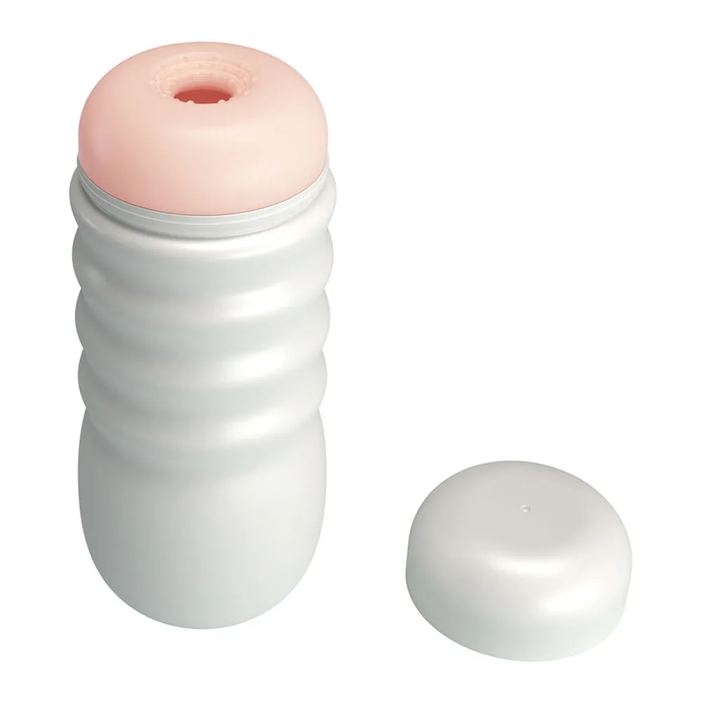 Masturbateur cylindrique beige chair avec texture ondulée, gaine extractible rose pâle, étui blanc à nervures avec couvercle, et petite boule violette texturée