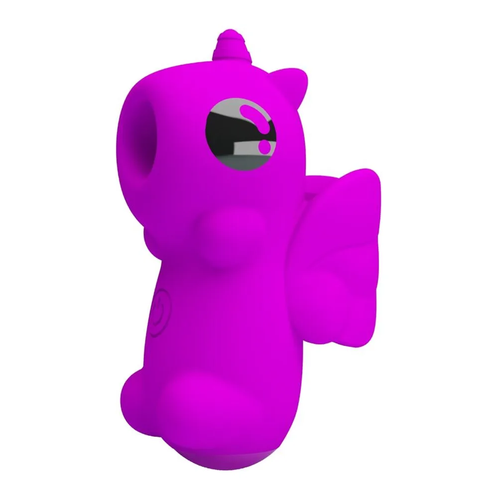 Stimulateur magique fuchsia en forme de licorne stylisée avec oreilles pointues, oeil noir et détails en relief, vue de profil sur fond blanc
