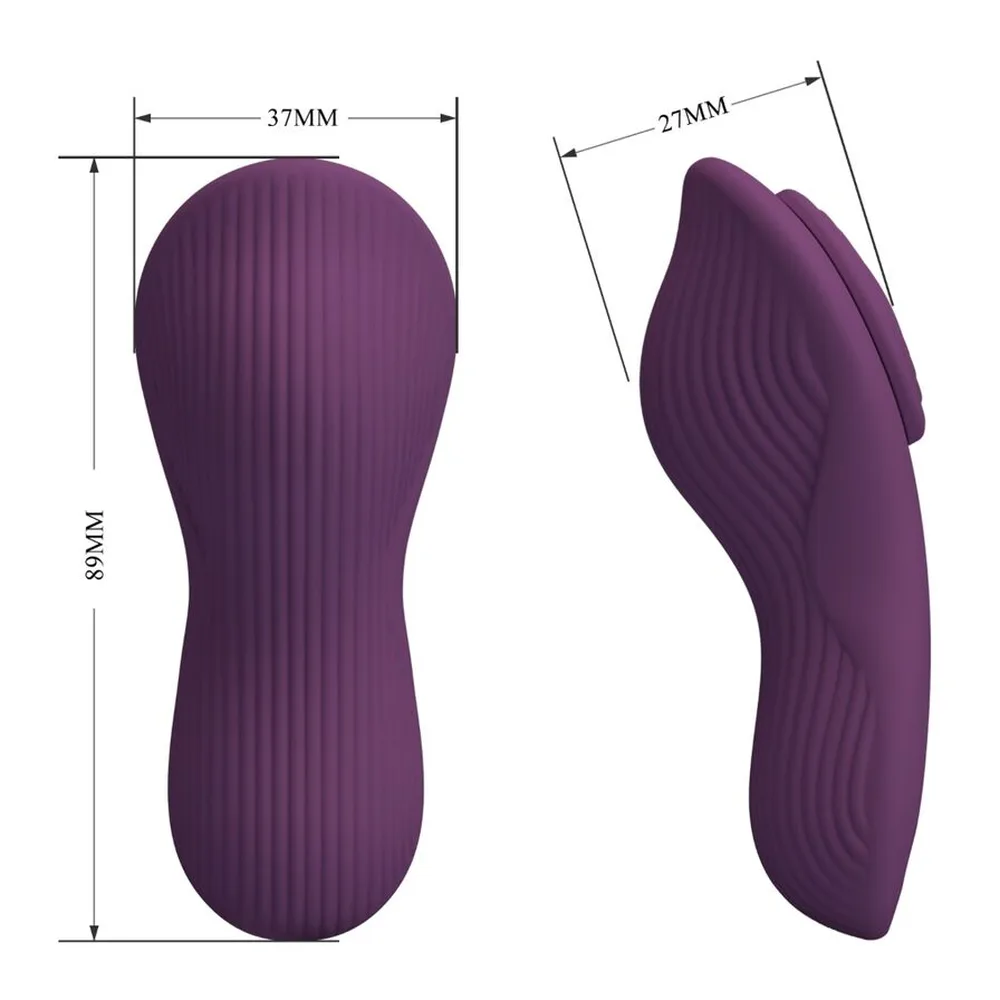 Stimulateur clitoridien violet mauve en silicone avec tête circulaire concave, bouton marche/arrêt et deux boutons de commande, accompagné d'une tête de rechange texturée