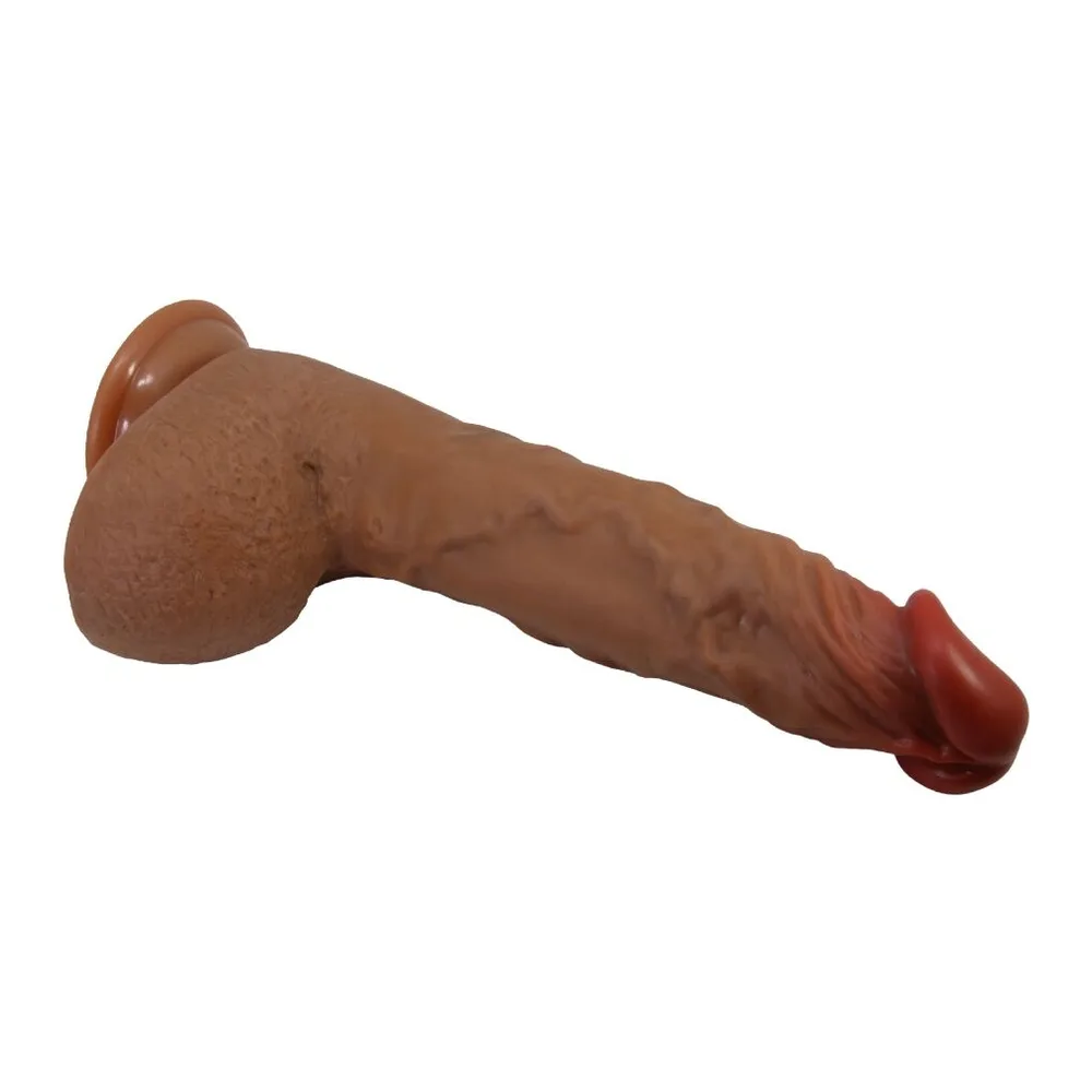 Vibromasseur réaliste en silicone beige avec tête rouge, base ventousée, sur fond blanc