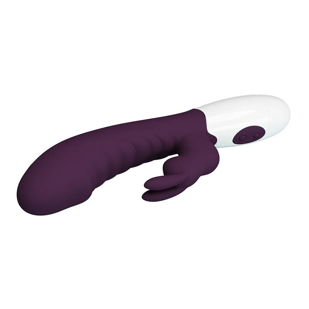 Vibromasseur rabbit en silicone violet et blanc avec oreilles flexibles, côtes texturées et corps ergonomique, manche blanc à pile