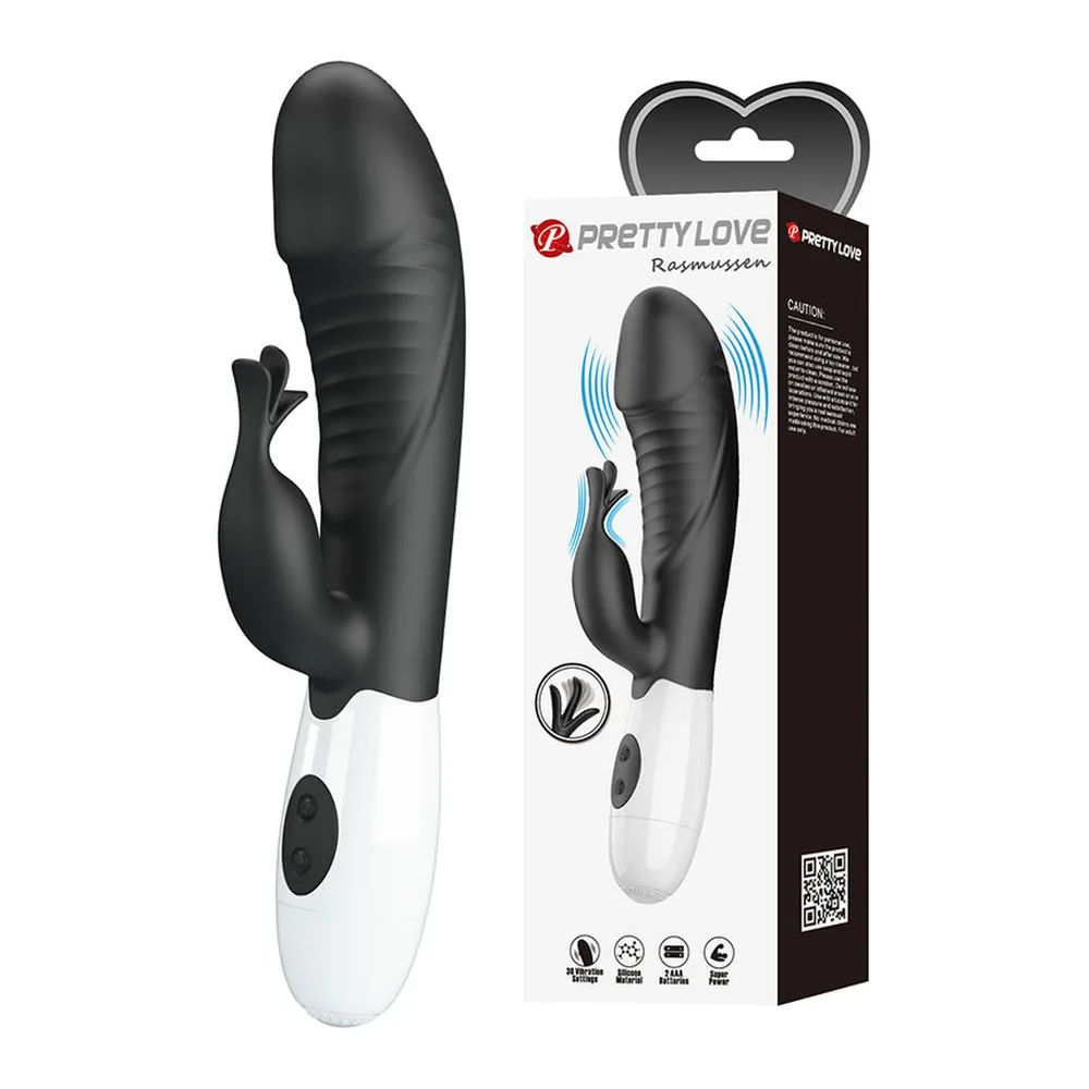 Vibromasseur rabbit en silicone violet et blanc avec oreilles flexibles, côtes texturées et corps ergonomique, manche blanc à pile