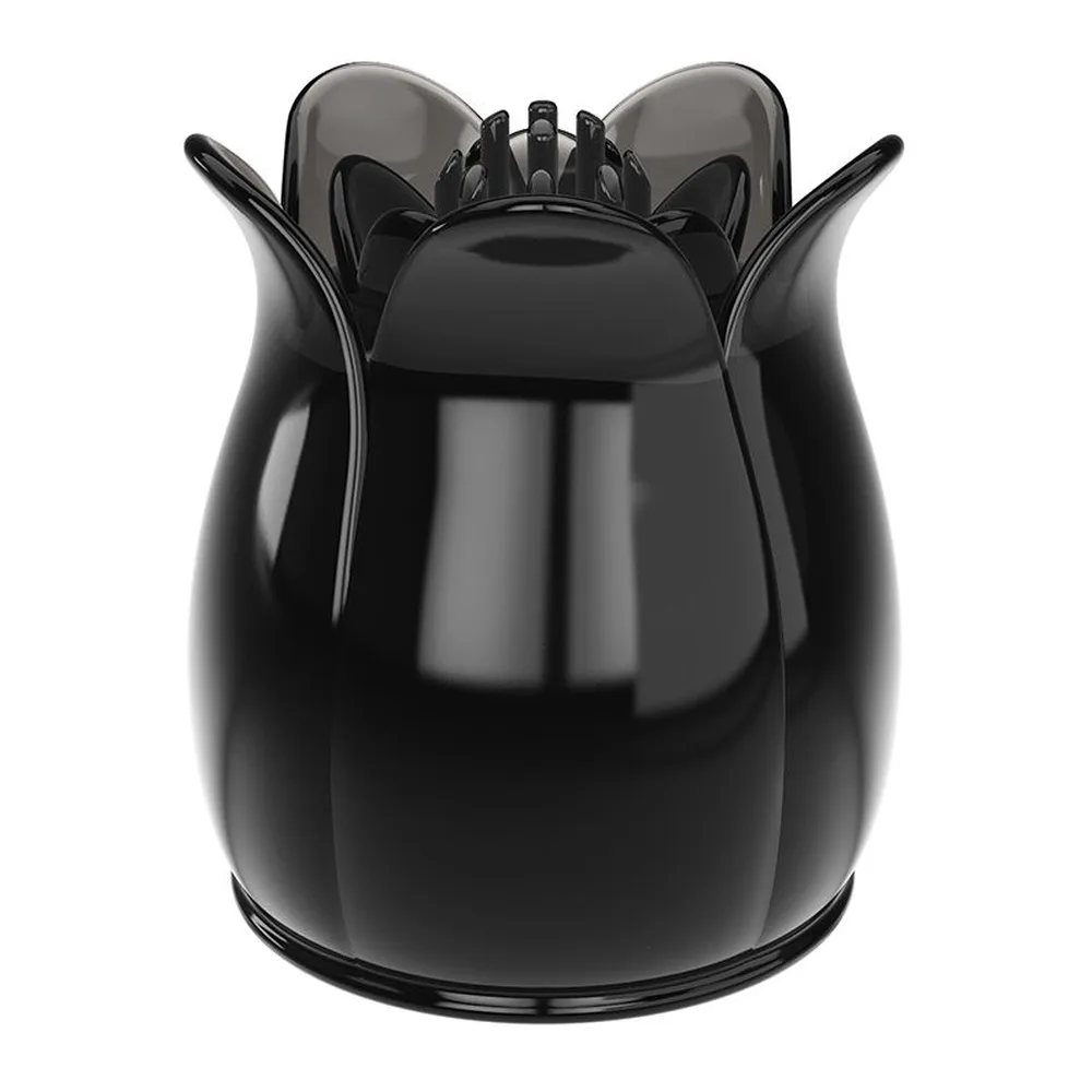 Tête de stimulateur clitoridien en silicone noir brillant, de forme arrondie avec pétales relevés, embout compatible avec wand vibrant, vue de face sur fond neutre