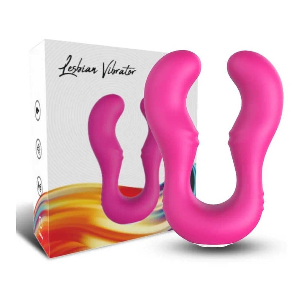 Vibrateur rose bonbon en silicone en forme de U large avec deux pointes arrondies, présenté avec son emballage blanc et sa télécommande sans fil
