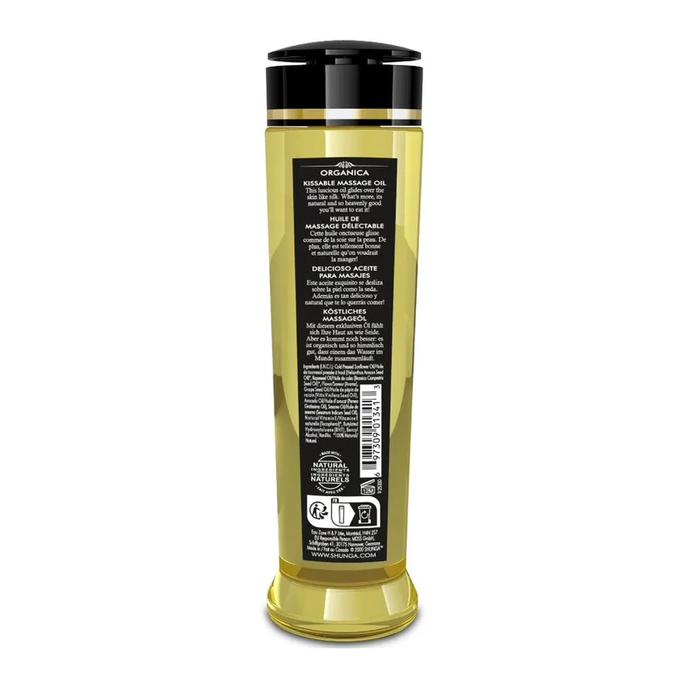 Flacon de 240 ml d'huile de massage Organica Shunga jaune clair avec bouchon noir, étiquette illustrée de framboises roses, posé à côté de framboises fraîches sur fond blanc