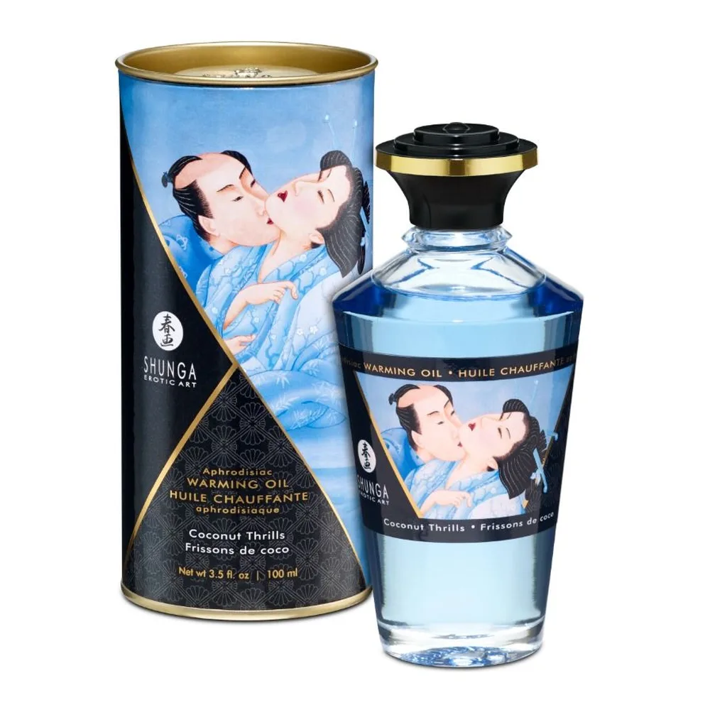 Flacon d'huile de massage effet chaleur à la noix de coco Shunga 100 ml avec bouchon doré et noir, accompagné de son emballage cylindrique bleu et noir orné d'illustrations asiatiques