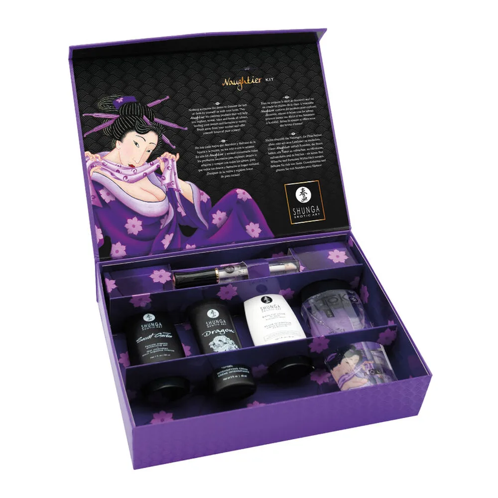 Flacon noir cylindrique de crème Shunga Dragon 60 ml avec étiquette blanche ornée d'un dragon blanc gravé, texte argenté et logo circulaire en haut