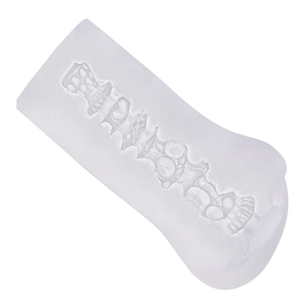 Emballage et masturbateur Boundless Vulva blanc translucide de la marque Calexotics, forme anatomique avec extrémité texturée, accompagné de pictogrammes indiquant Pureskin, ultra soft, textured et heavy duty