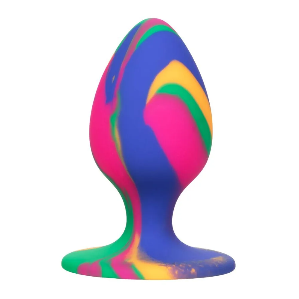 Plug anal Medium en silicone avec motifs tie-dye bleu, rose fuchsia, vert et jaune, base ventouse plate, forme ovoïde évasée