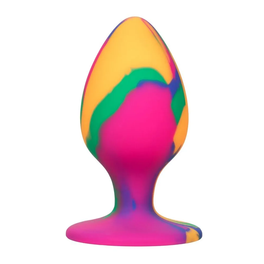 Plug anal en silicone aux couleurs tie-dye avec dégradés de jaune, rose, vert et bleu, forme bulbeuse et base évasée, sur fond blanc