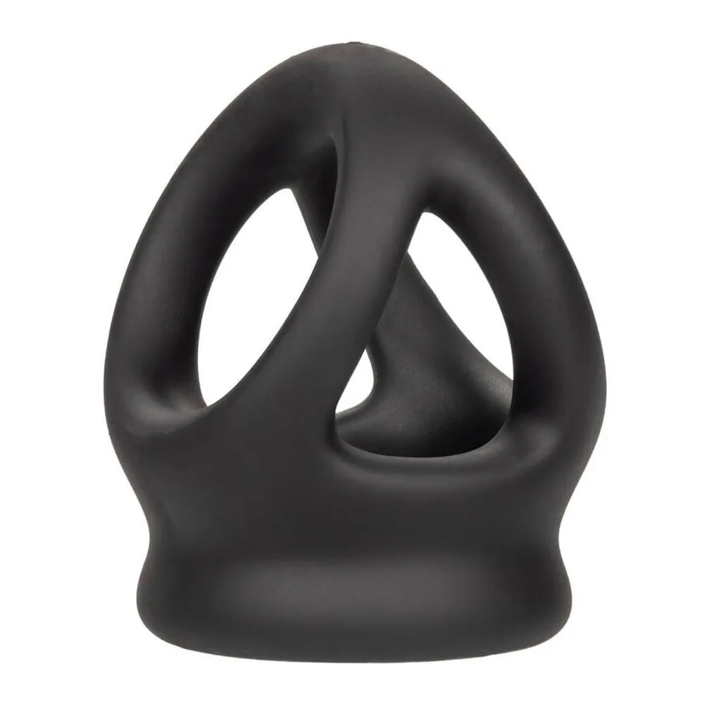 Cockring en silicone noir souple avec structure annulaire double, conçu pour enserrer le pénis et les testicules, présenté sur fond blanc