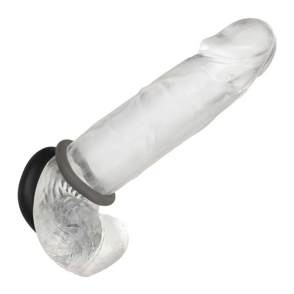 Deux anneaux en silicone noir de diamètres différents, en vue de face sur fond blanc, l'un plus grand à gauche, l'autre plus petit à droite