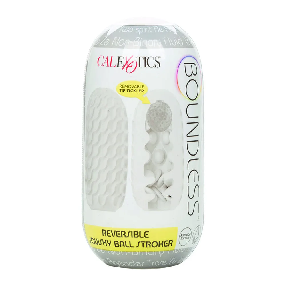 Masturbateur blanc translucide aux reliefs texturés avec ouverture en forme de bouche, présenté aux côtés d'une petite balle grise texturée