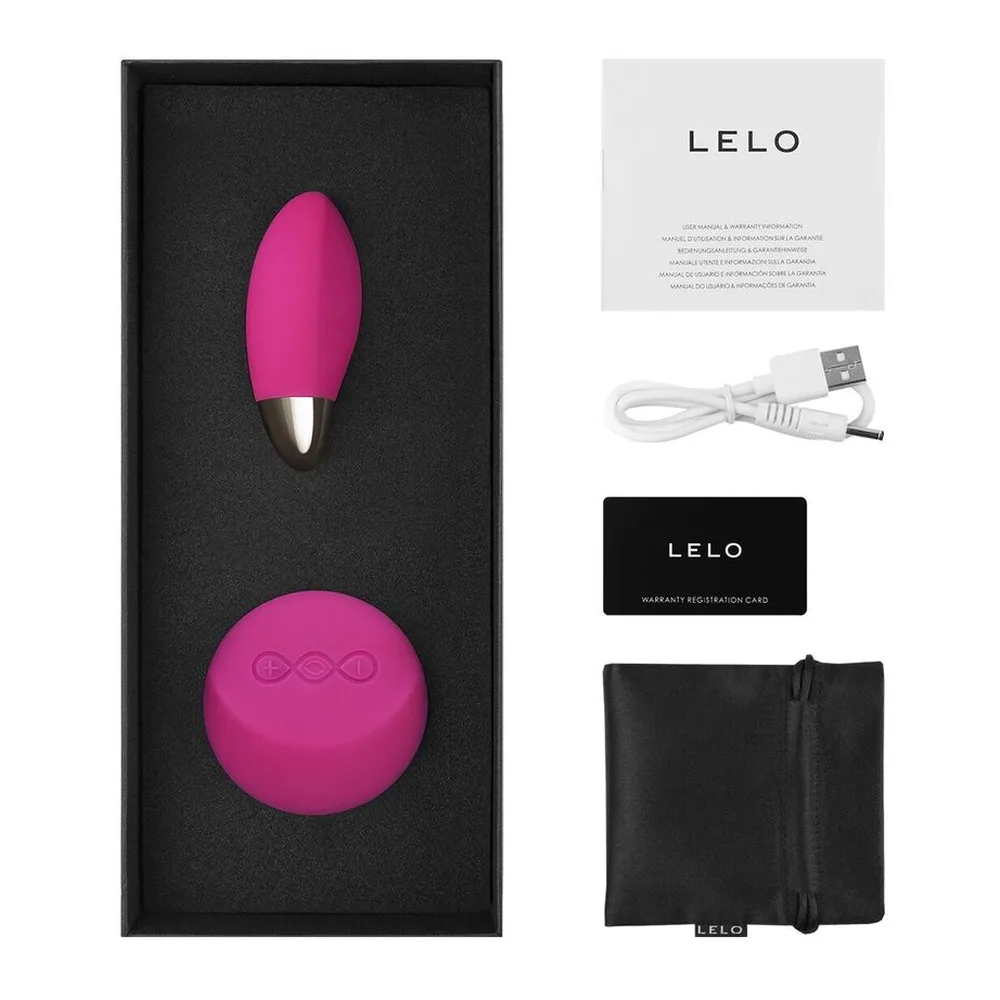 Œuf vibrant rose fuchsia en silicone avec télécommande sans fil blanche et rose, reliés par un câble noir, sur fond blanc