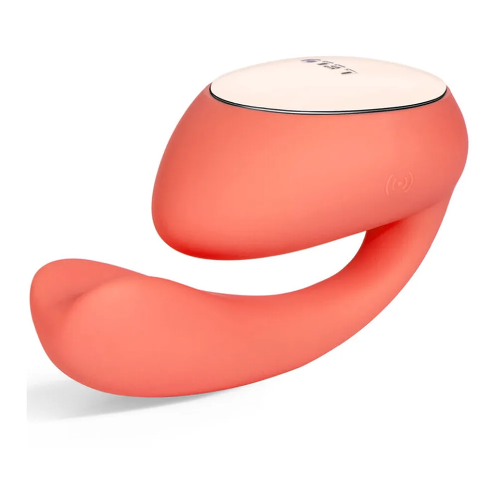 Vibromasseur noir en silicone avec tête arrondie beige, corps courbé et poignée ergonomique, moteurs visibles par symboles discrets sur le côté