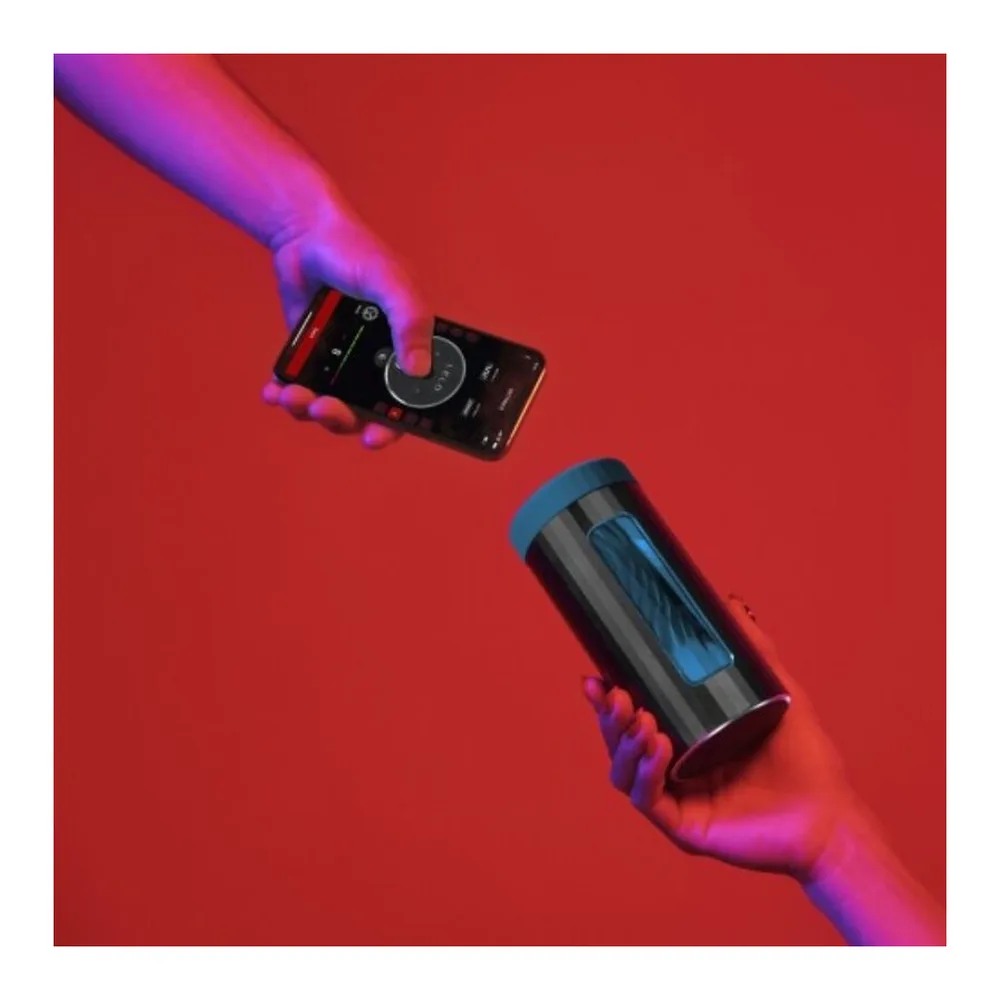 Emballage noir du masturbateur LELO F1s V3, présentant le produit en silicone rouge à travers une fenêtre transparente, avec bande rouge et inscriptions dorées