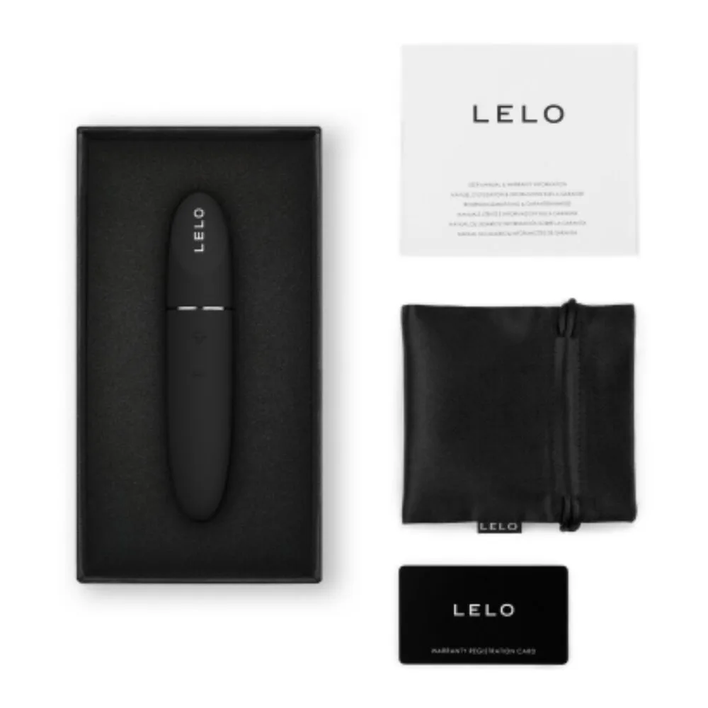 Emballage noir ouvert de stimulateur clitoridien LELO Mia 3 en silicone violet, avec brochure, pochette de rangement et carte d'enregistrement