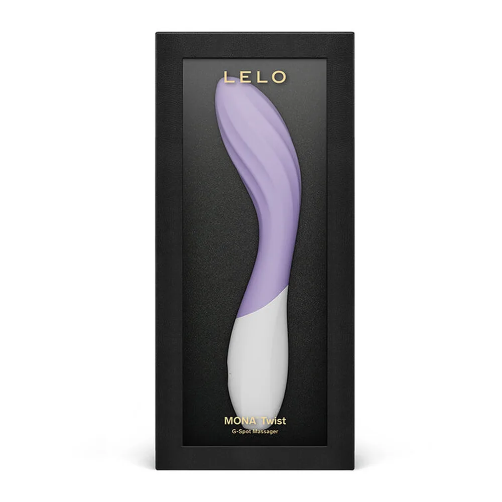 Vibromasseur Mona Twist en silicone violet et blanc avec embout large, présenté dans son emballage noir avec câble USB, pochette de rangement noire et documentation LELO