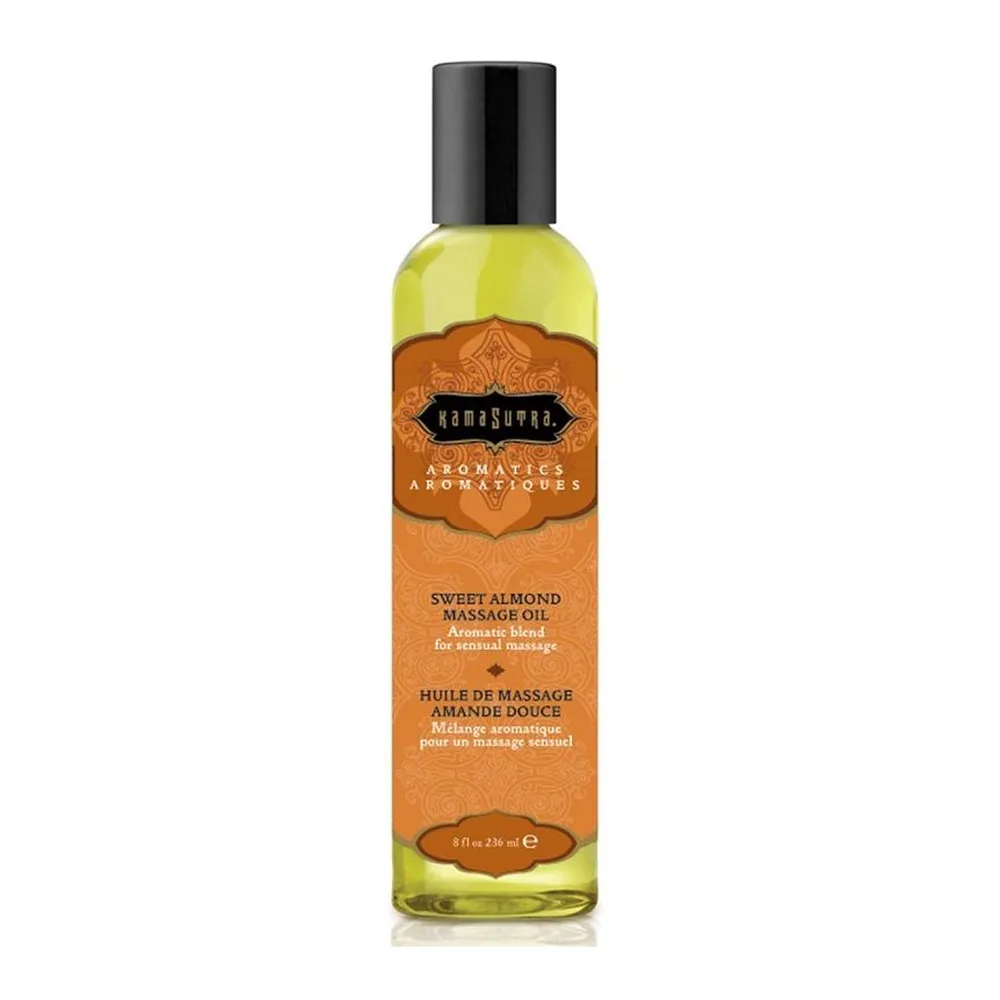 Flacon de 236 ml d'huile de massage Kama Sutra aux amandes douces, liquide jaune clair sous étiquette orange et noire, capuchon noir