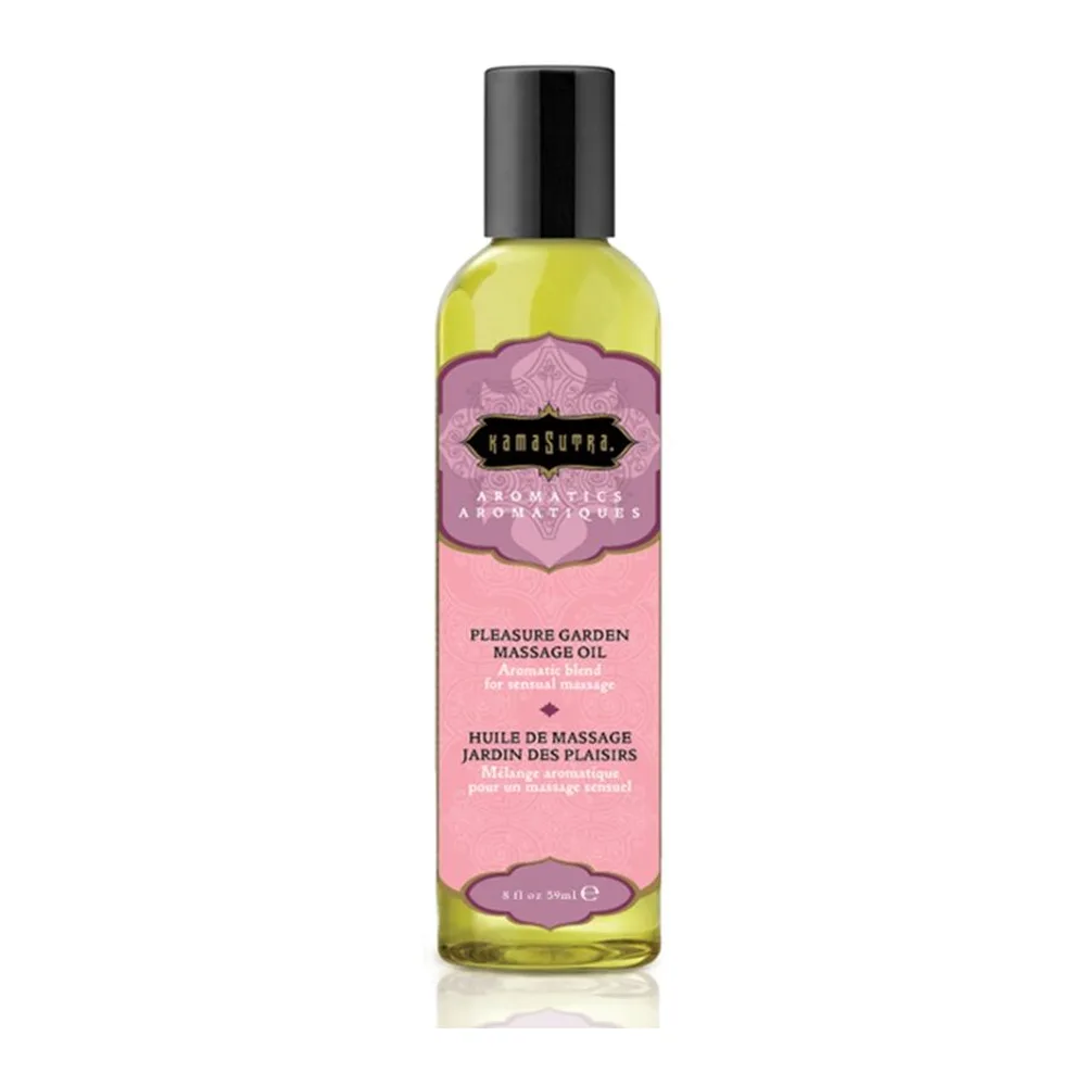 Flacon d'huile de massage Pleasure Garden avec étiquette rose et label noir, contenu jaune pâle, bouchon noir, sur fond blanc