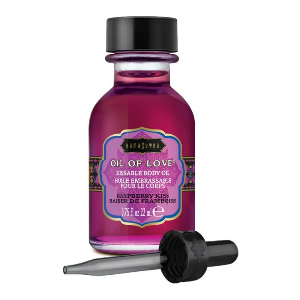 Flacon de 22 ml d'huile embrassable rose fuchsia à la framboise, avec bouchon noir et applicateur pipette, étiquette ornée aux motifs colorés