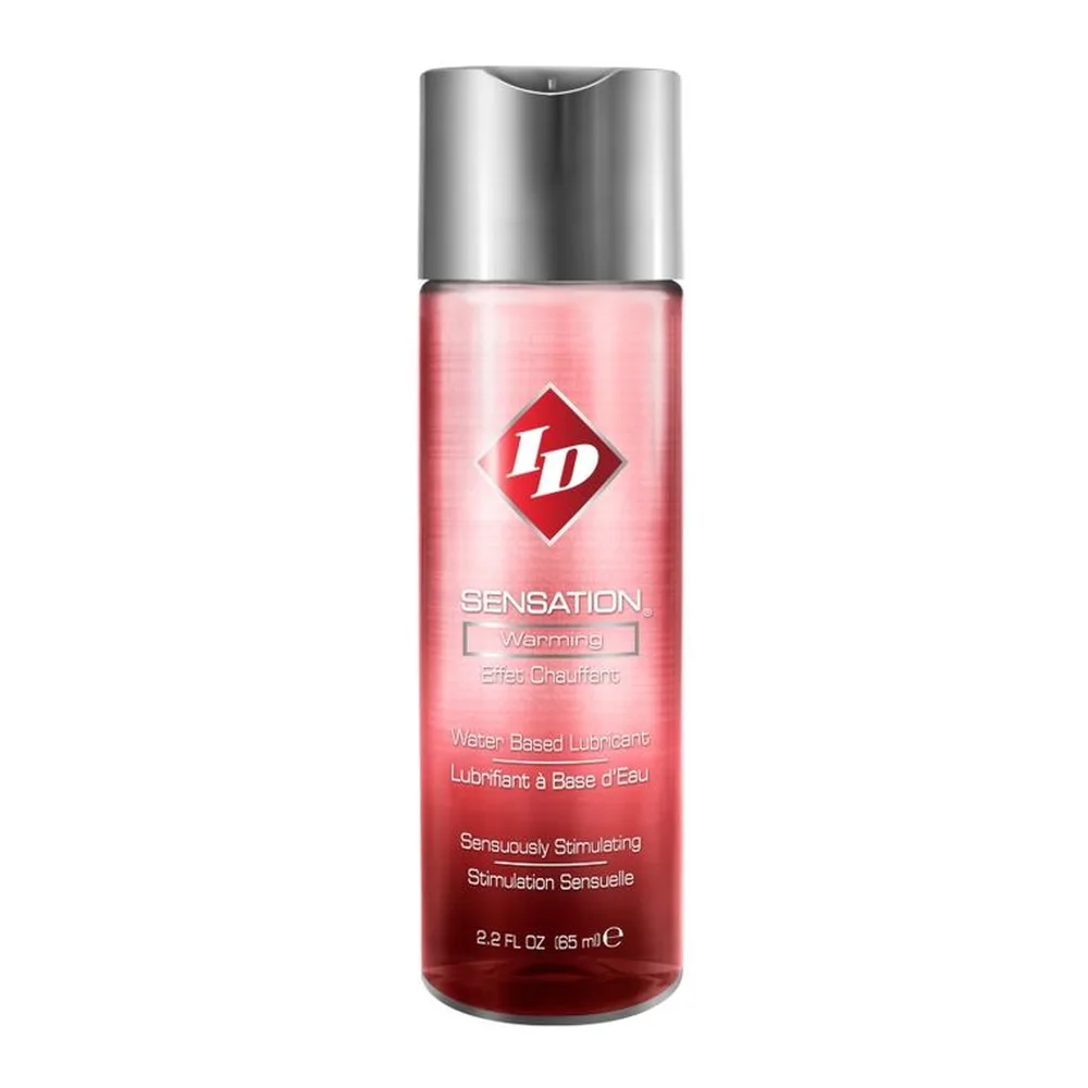 Flacon de lubrifiant à base d'eau avec bouchon argenté, contenant un gel rose à rouge, étiqueté Sensation Warming, 85 ml