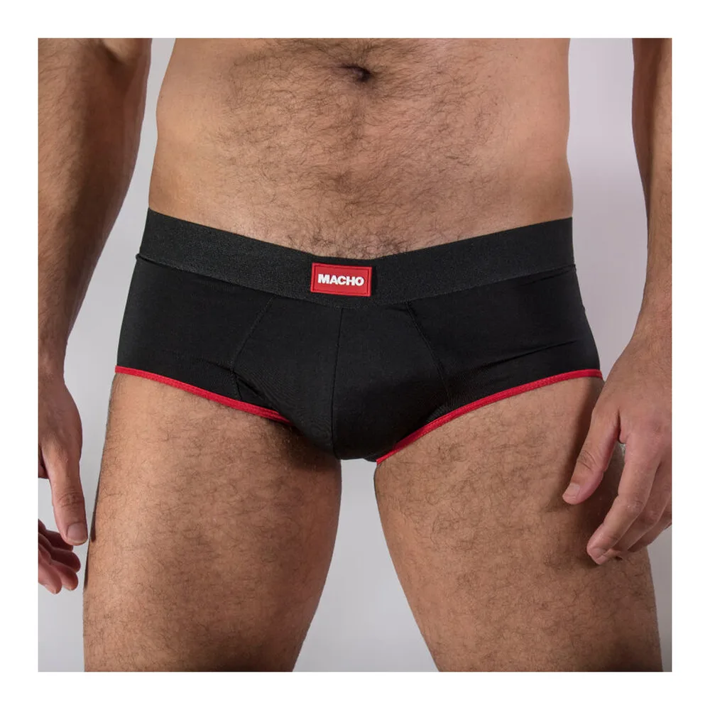 Slip noir porté de face, ceinture élastiquée grise et bordure rouge vif sur les côtés, coupe classique