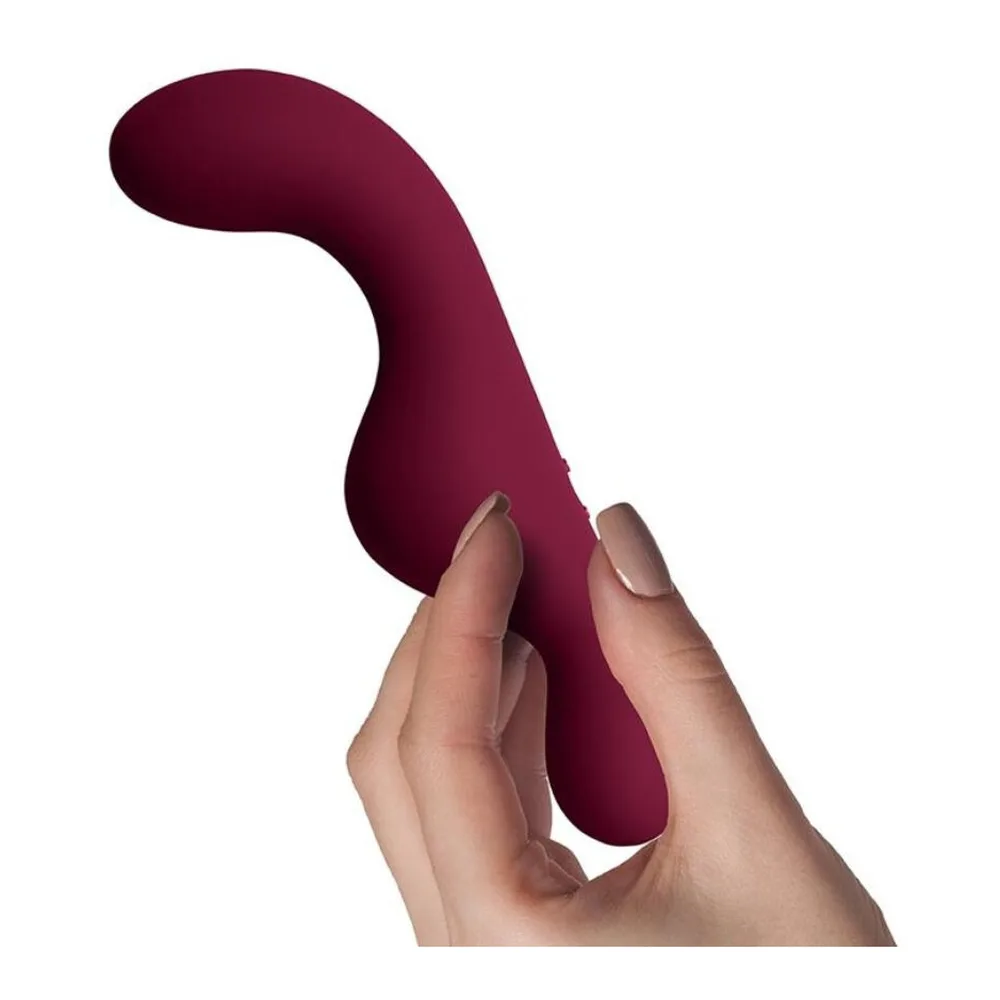 Vibromasseur en silicone bordeaux foncé, forme épaulée avec tête arrondie, boutons de contrôle sur le corps et zone de stimulation en relief à la base, sur fond blanc