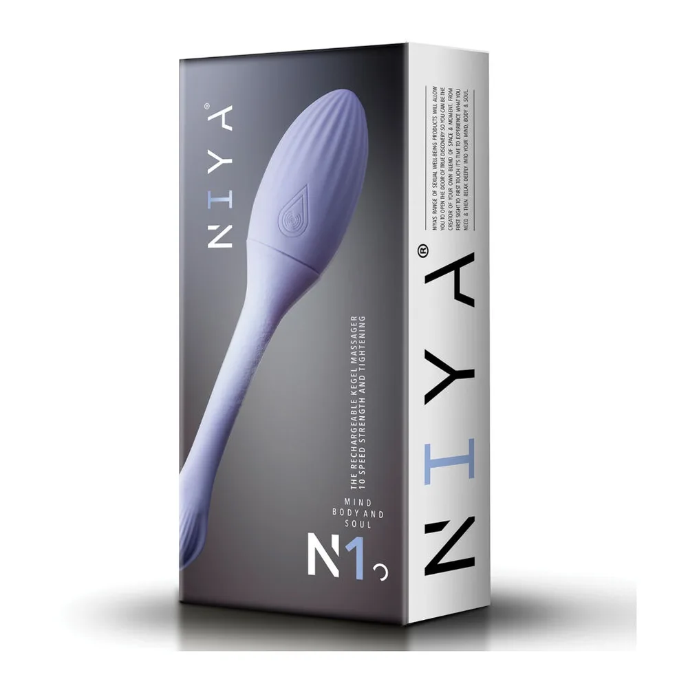 Emballage du masseur pelvien Niya N1 en violet lavande, montrant le produit avec sa queue flexible sur la face avant, boîte blanche et noire sur fond gris