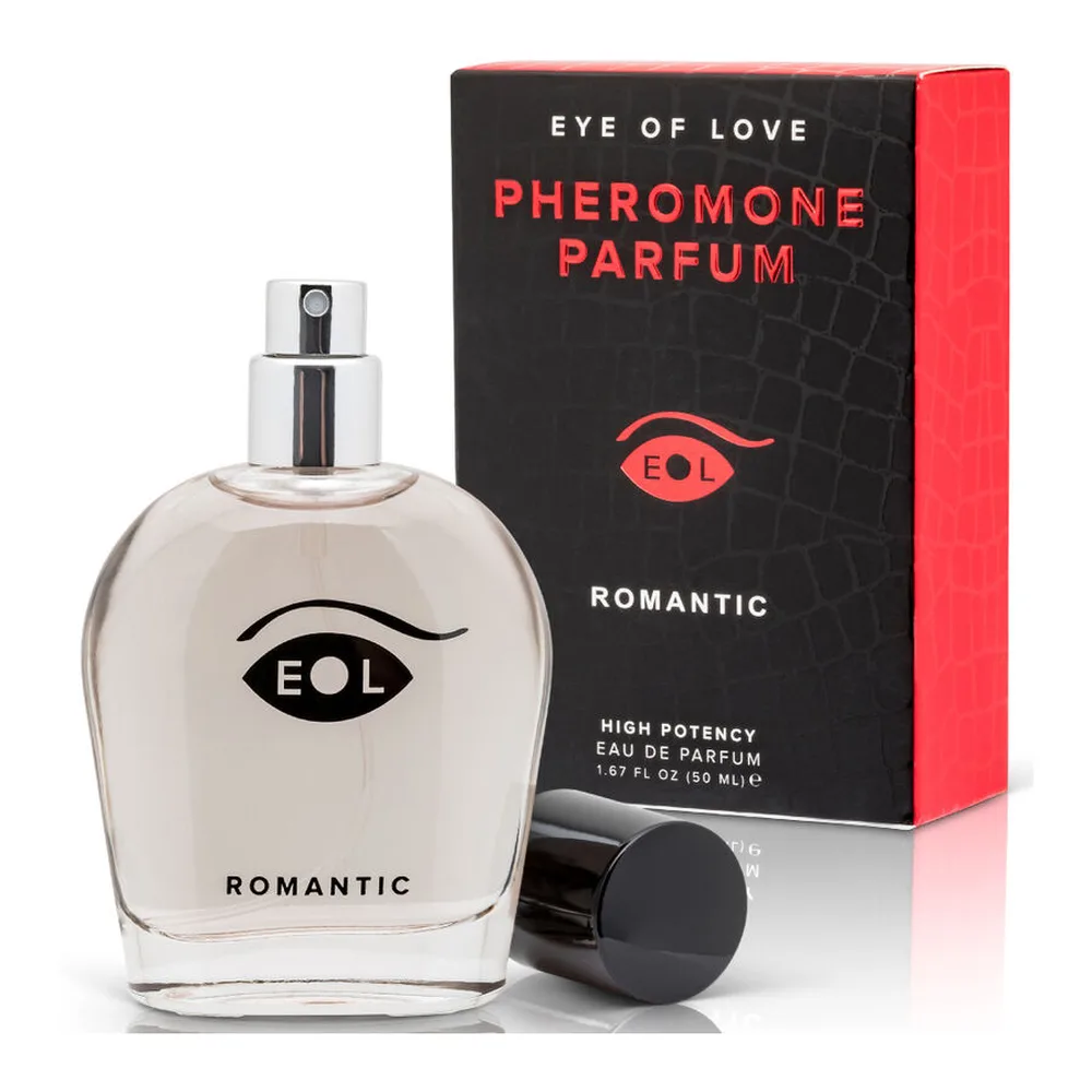 Flacon de parfum aux phéromones aux épaules carrées, rempli d'un liquide translucide clair, avec étiquette noire « EOL ROMANTIC » et vaporisateur chromé. Bouchon noir détaché à côté, fond blanc