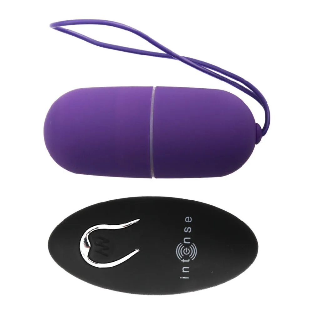 Œuf vibrant en silicone rose avec télécommande radio noire, vue de l'accessoire et de sa télécommande filaire accompagnant le produit