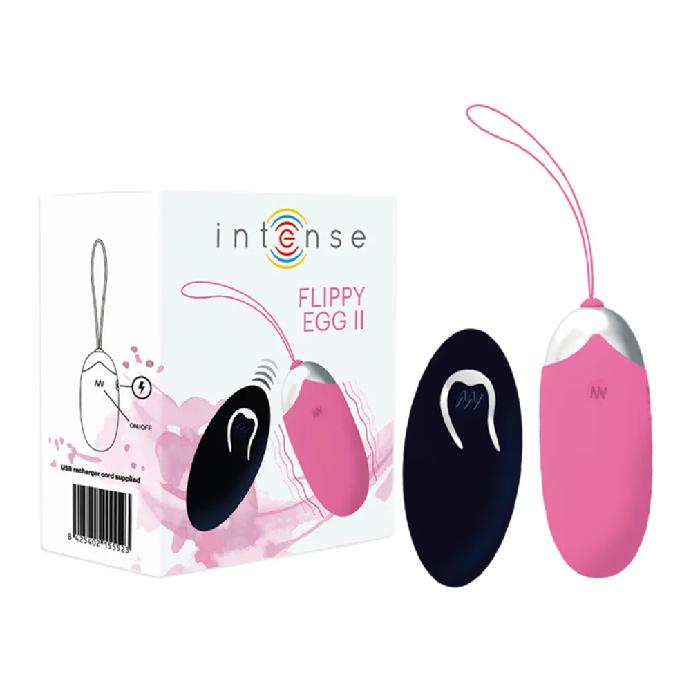 Œuf vibrant rose fuchsia en silicone avec anse de transport, accompagné de sa télécommande noire filaire portant le logo de la marque