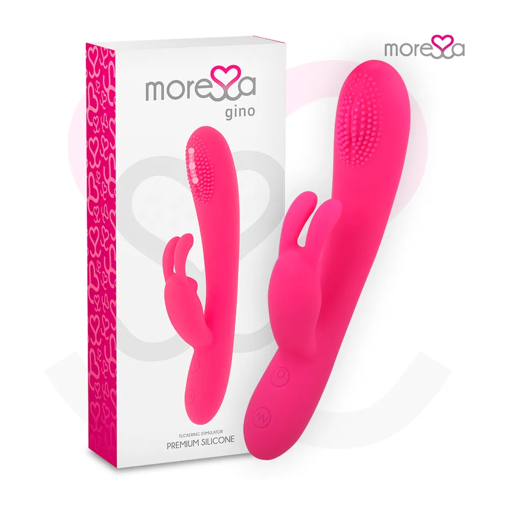 Vibromasseur rabbit en silicone rose vif avec bras clitoridien courbe, affichant des points de stimulation et une flèche indiquant le mouvement de scintillement, logo moreXXa visible
