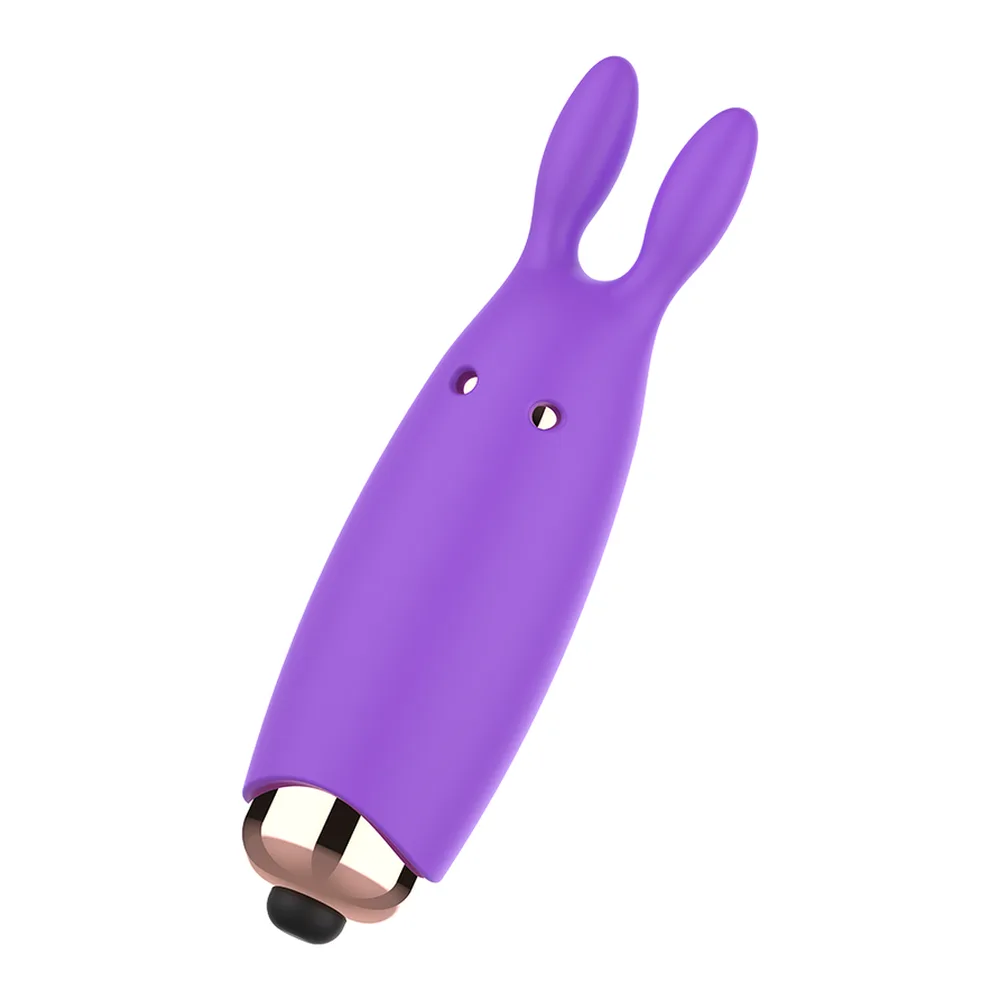 Emballage du stimulateur Bugsy de Woman Vibe, vibromasseur en silicone violet avec motif floral, montrant le produit et ses caractéristiques techniques à l'avant et l'arrière