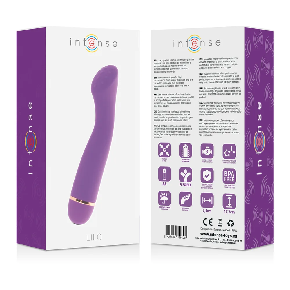 Vibromasseur rose fuchsia en silicone avec tige lisse et pointe incurvée, anneau métallique doré à la base, fond blanc