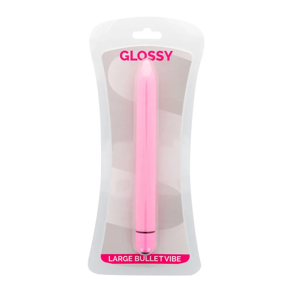 Vibromasseur rose pâle de forme allongée et effilée, corps lisse en silicone avec anneau de commande noir à la base, sur fond blanc
