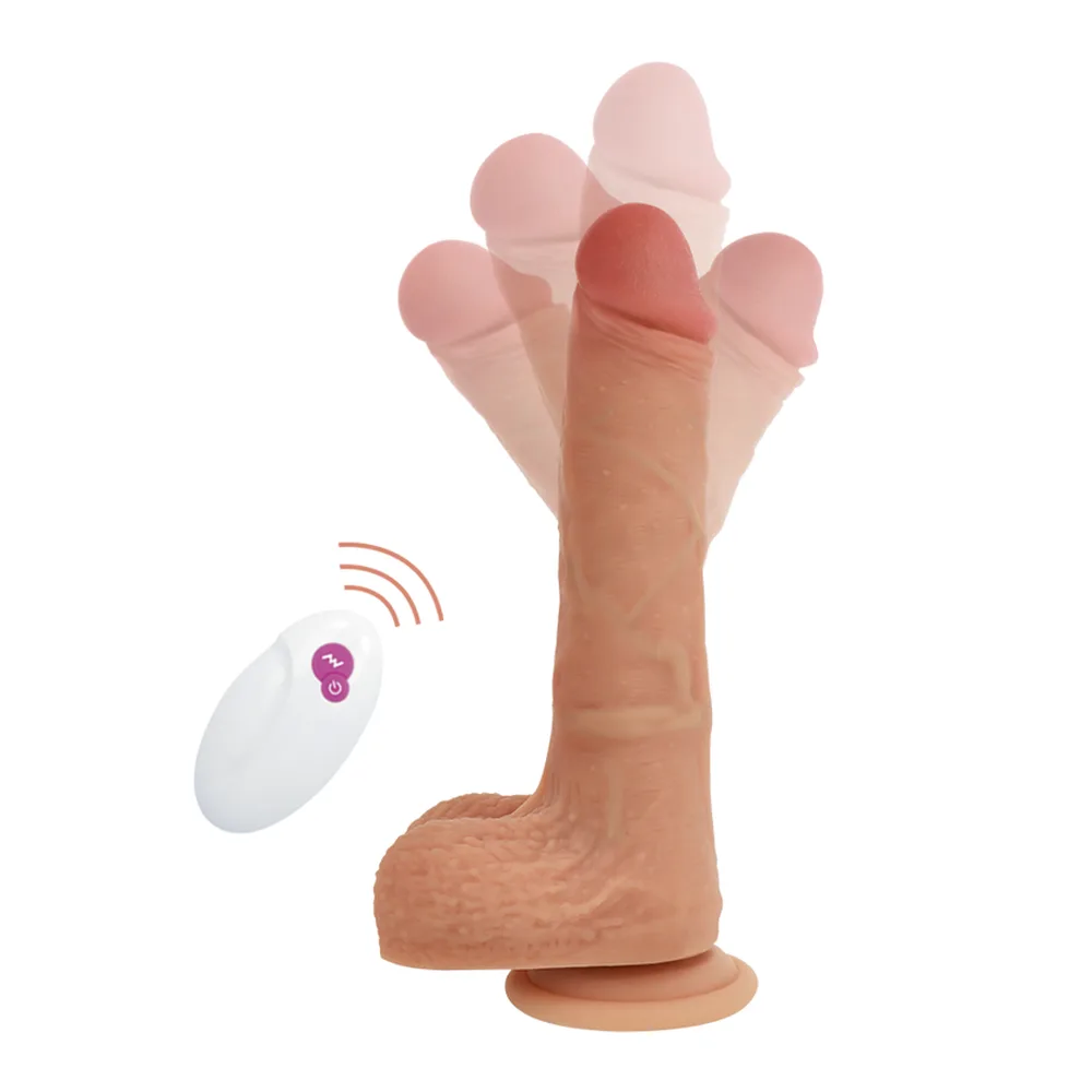 Vibromasseur réaliste en silicone couleur chair avec tête rose et texture détaillée, fixé sur un socle ventouse, accompagné de sa télécommande blanche sans fil