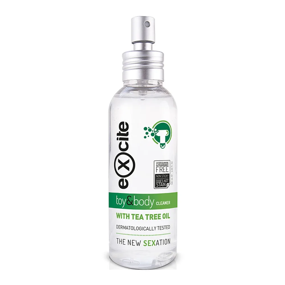 Flacon spray de 100 ml transparent contenant un nettoyant incolore, avec étiquette verte mentionnant « toy & body cleaner » et « with tea tree oil », pompe pulvérisatrice argentée, fond blanc