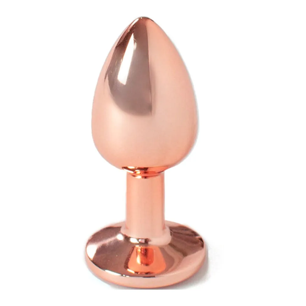 Plug anal en aluminium rose pêle brillant, forme ovoïde arrondie avec base circulaire plate, sur fond blanc