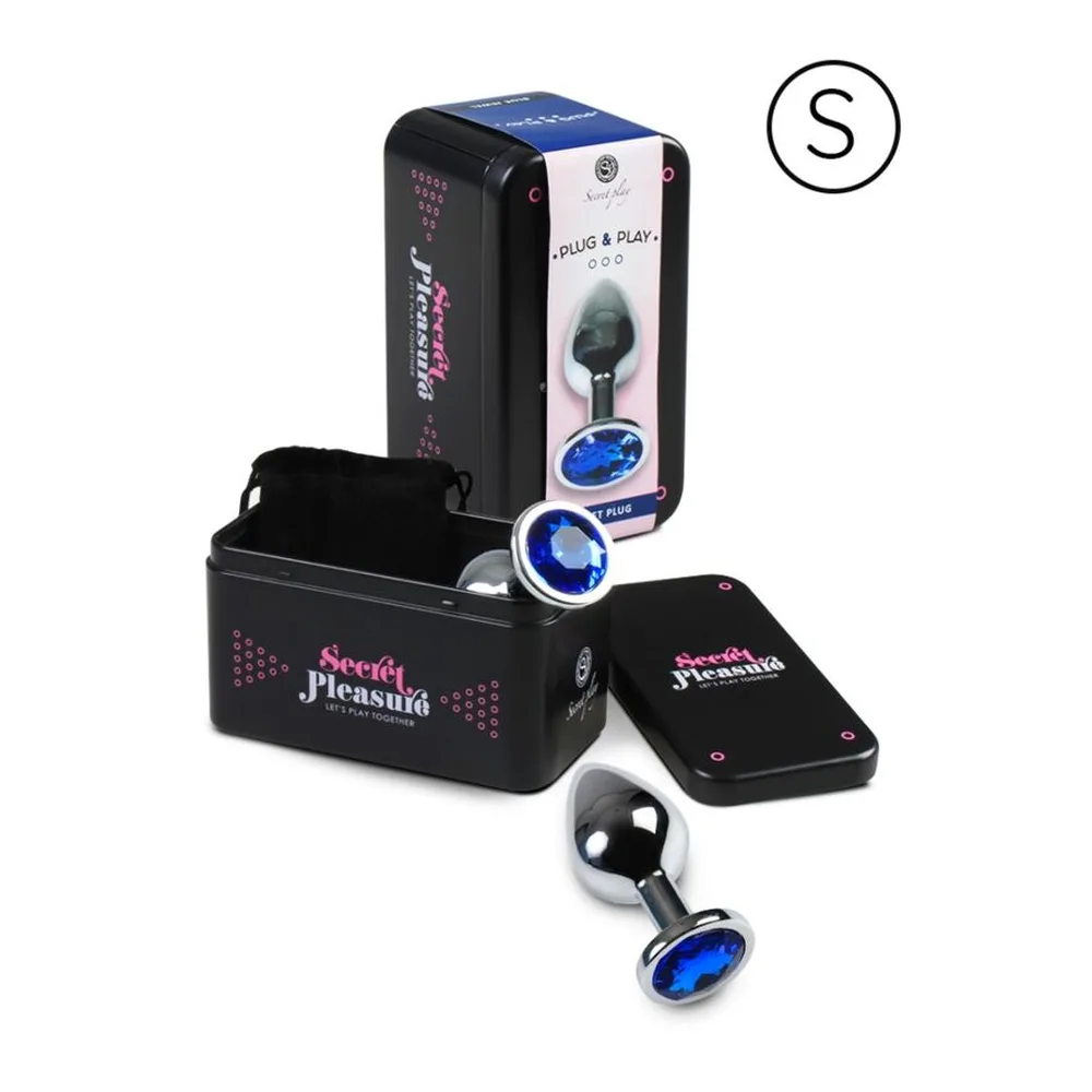 Coffret de présentation rose et noir contenant un plug anal en aluminium noir avec base argentée, son boîtier de rangement noir, une télécommande et deux inserts interchangeables de tailles différentes
