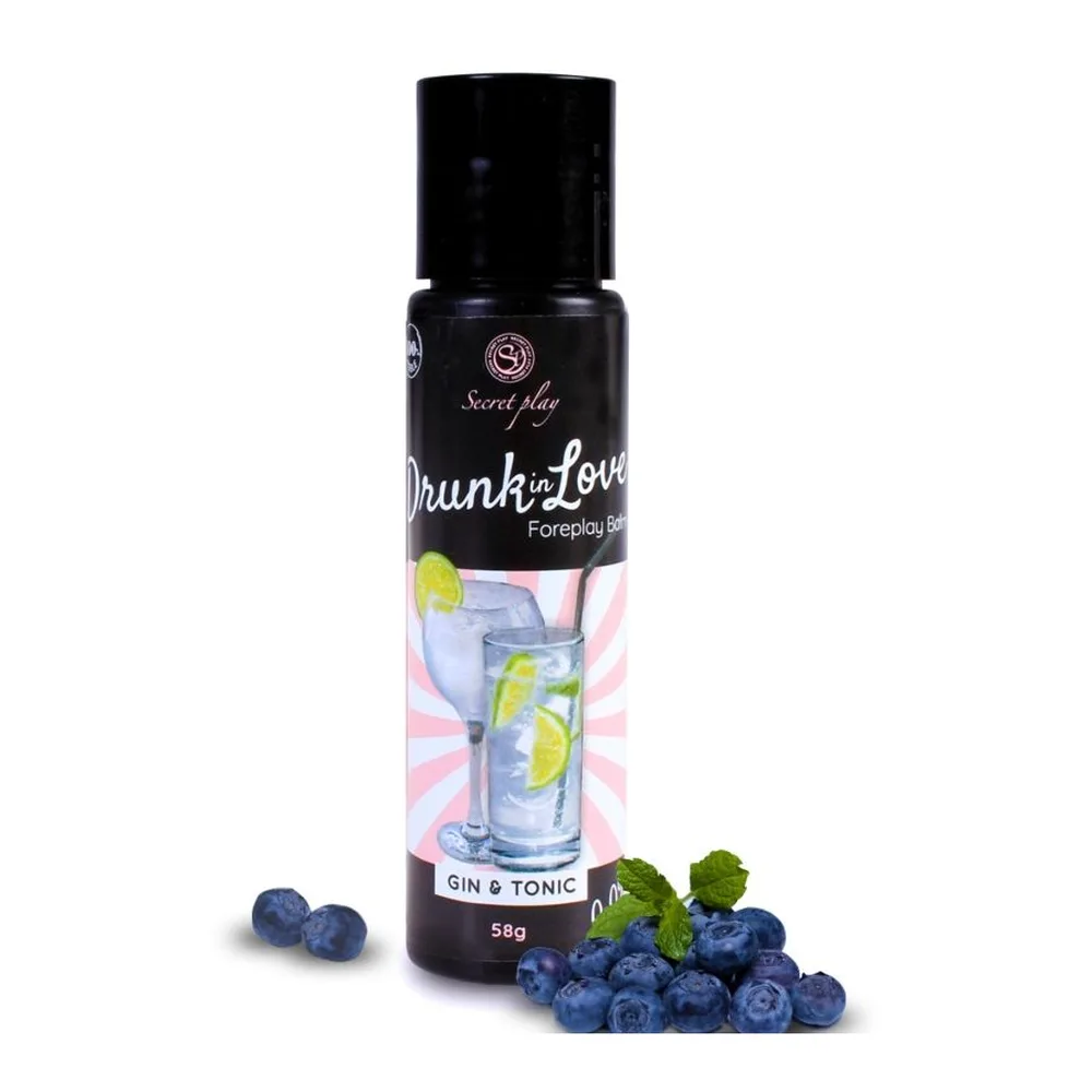 Flacon de lubrifiant comestible Drunk Love Gin & Tonic 58g au design noir avec étiquette illustrée d'un verre de cocktail citron-myrtille, entouré de baies fraîches de myrtilles