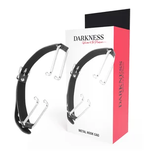 Emballage du bâillon Darkness Metal Hook Gag avec bandeau en cuir noir et deux crochets métalliques transparents servant d'écarteurs buccaux, sur fond blanc et rose