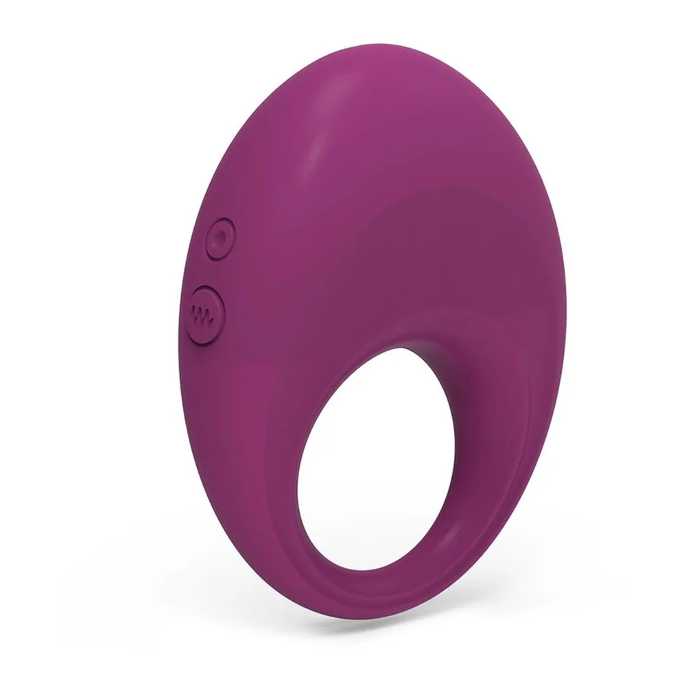 Cockring ovale en silicone pourpre avec ouverture centrale, télécommande grise intégrée sur le côté, fond blanc