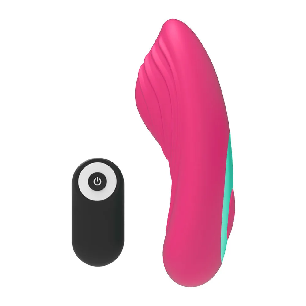 Vibromasseur rose vif avec insert turquoise et sa télécommande noire sans fil dotée d'un bouton marche/arrêt, sur fond blanc