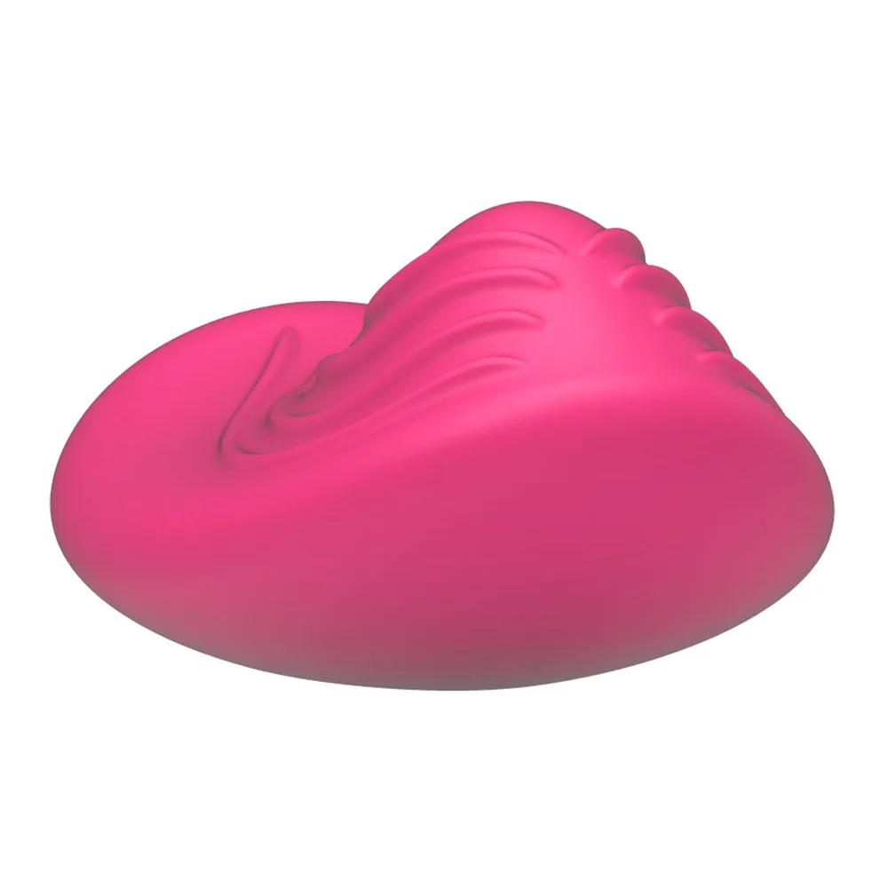 Vibromasseur rose vif avec insert turquoise et sa télécommande noire sans fil dotée d'un bouton marche/arrêt, sur fond blanc