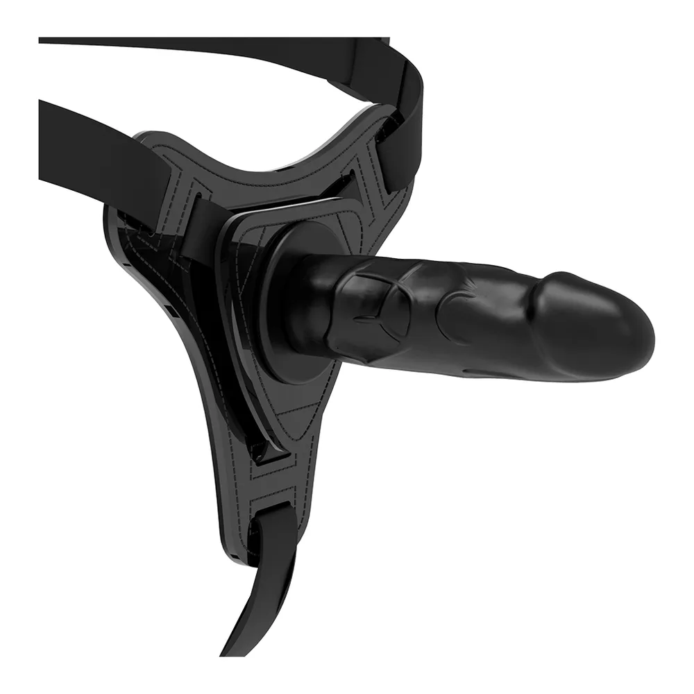 Harnais strap-on noir avec gode silicone, emballage Fetish Submissive affichant le produit monté et prêt à l'emploi